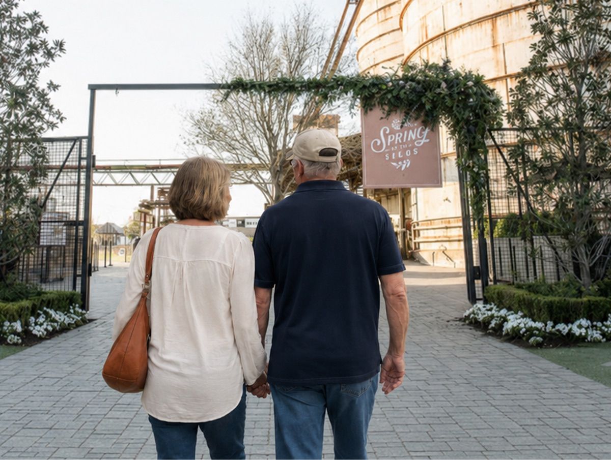 A couple walking together at the Magnolia Silos in Waco